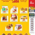 Grand Hypermarket promotional flyer featuring a dedicated discount page for Sadia frozen chicken, beef burgers, and nuggets.