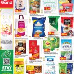 Grand Hypermarket discount catalogue page displaying bulk bags of Basmati and Jasmine rice, Rainbow milk powder, tea, and cooking essentials.