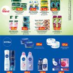 Grand Hypermarket beauty aisle promotion sheet displaying Dabur Herbolene, Vatika hair products, and Nivea skincare creams.