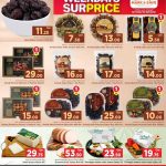 Selection of Ajwa and Sagai dates alongside gourmet cheeses at Mark & Save Hyperstore Qatar.