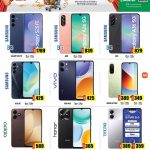Latest smartphones display at Grand Hypermarket featuring Samsung Galaxy S25 FE, Galaxy A26, Galaxy A36, Vivo Y05, Redmi A7 Pro, and Oppo A6C.