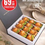 A mini chicken burger catering box containing twelve pieces on offer at Monoprix available on demand